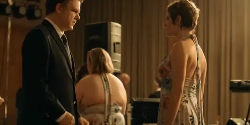 A scene from The Lobster showing a couple in an awkward dance during a disco