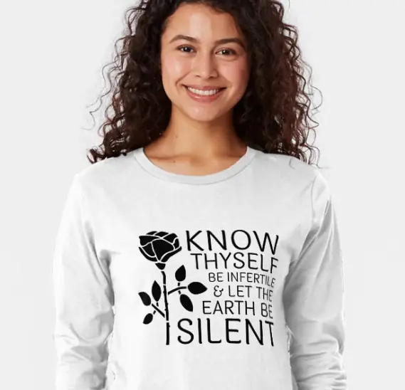 A smiling lady wearing a t shirt with a quote from Zapffe's Last Messiah